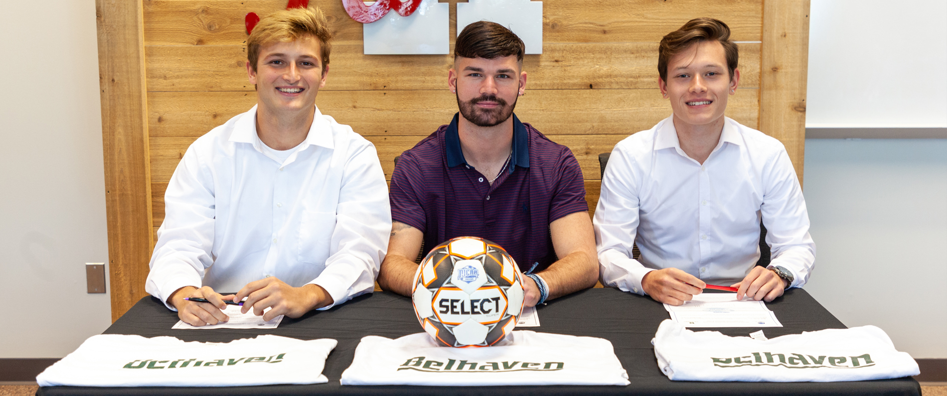 Three Bulldogs sign with Belhaven